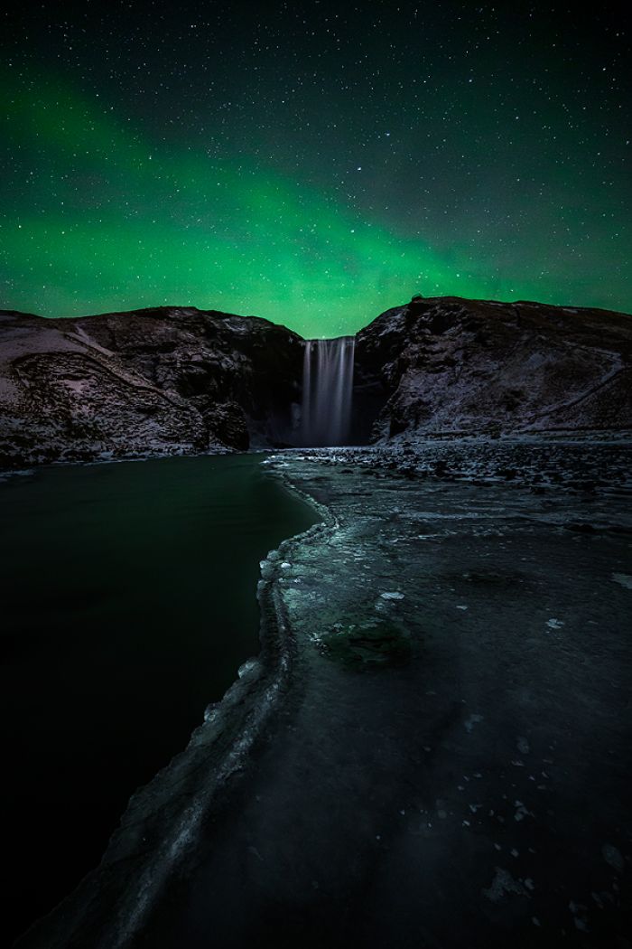 12 aurora skogafoss